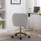 This swivel office chair is height-adjustable, has wheels, gold-plated legs, and a chrome-plated base.