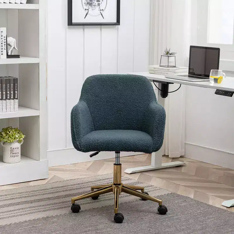 This swivel office chair is height-adjustable, has wheels, gold-plated legs, and a chrome-plated base.