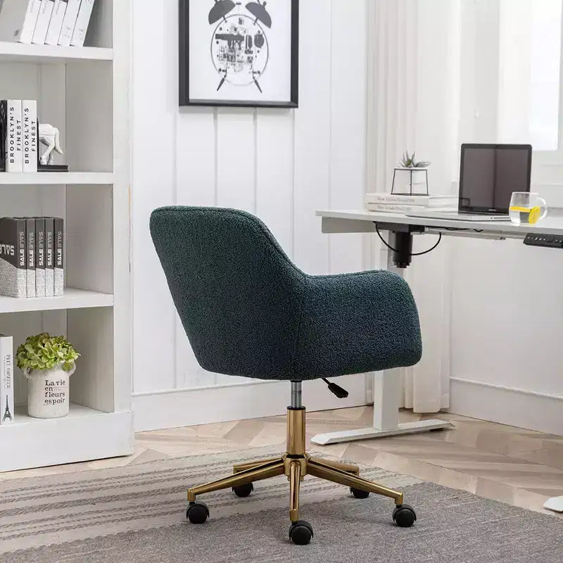 This swivel office chair is height-adjustable, has wheels, gold-plated legs, and a chrome-plated base.